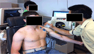 This picture is an example of how a Biodex machine was used to hold the participants' shoulders at a prescribed angle.  The participant in this picture is having his shoulder imaged at 45 degrees of shoulder abduction. 